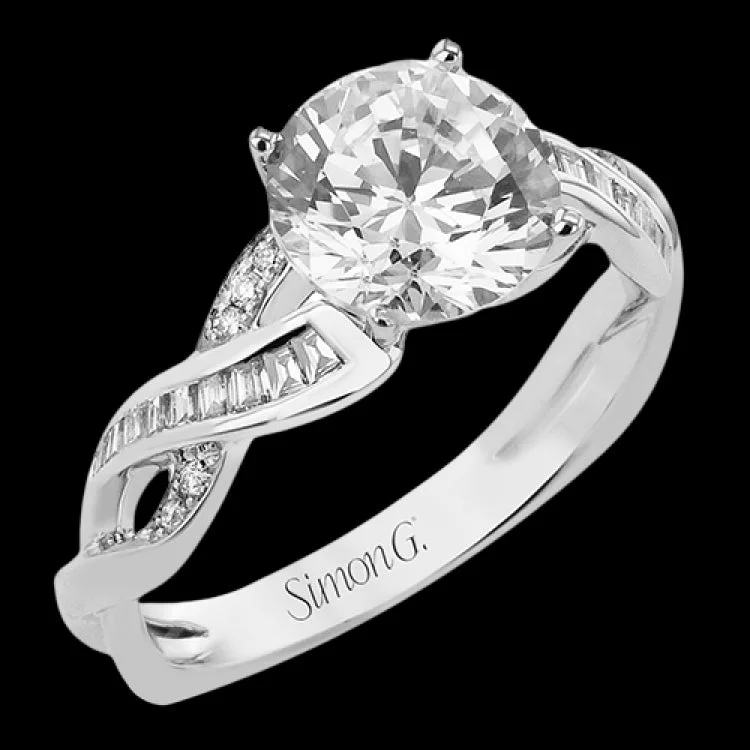 Women’s unique round cut engagement ring-This infinity twist engagement ring in 18 kt white gold takes a 2 ctw center, and has a line of baguettes .25 ctw accented with .05 ctw RD diamonds