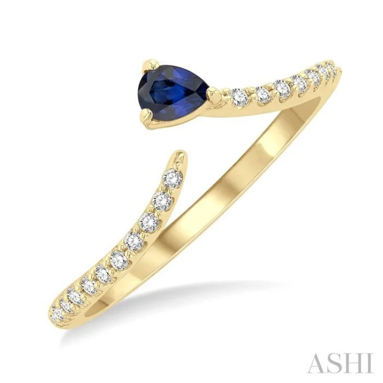 Women’s platinum engagement ring-4X3 MM Pear Cut Sapphire and 1/10 ctw Petite Round Cut Diamond Precious Fashion Ring in 10K Yellow Gold