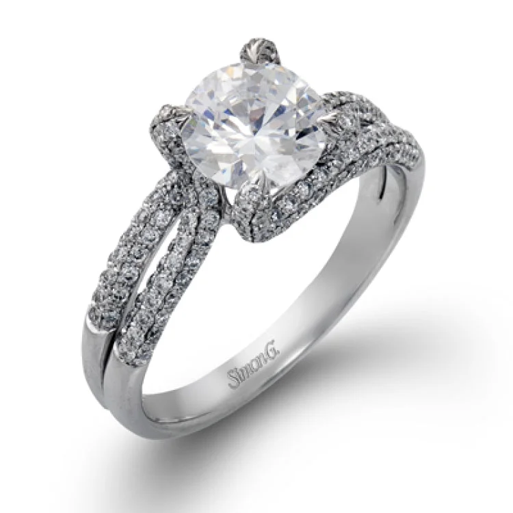 Women’s platinum engagement ring with diamonds-This lovely engagement ring showcases .59 ctw of white diamonds in a unique design.