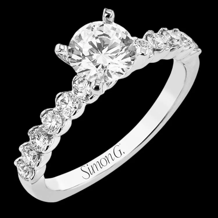 Women’s princess cut engagement ring-18K diamond engagement ring 0.50 ctw., features a half bezel setting on each individual side diamond which adds a modern bubble look to this ring