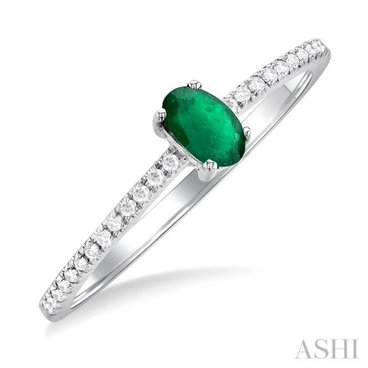 Women’s custom engagement ring designs-5x3 MM Oval Cut Emerald and 1/10 ctw Petite Round Cut Diamond Precious Fashion Ring in 10K White Gold