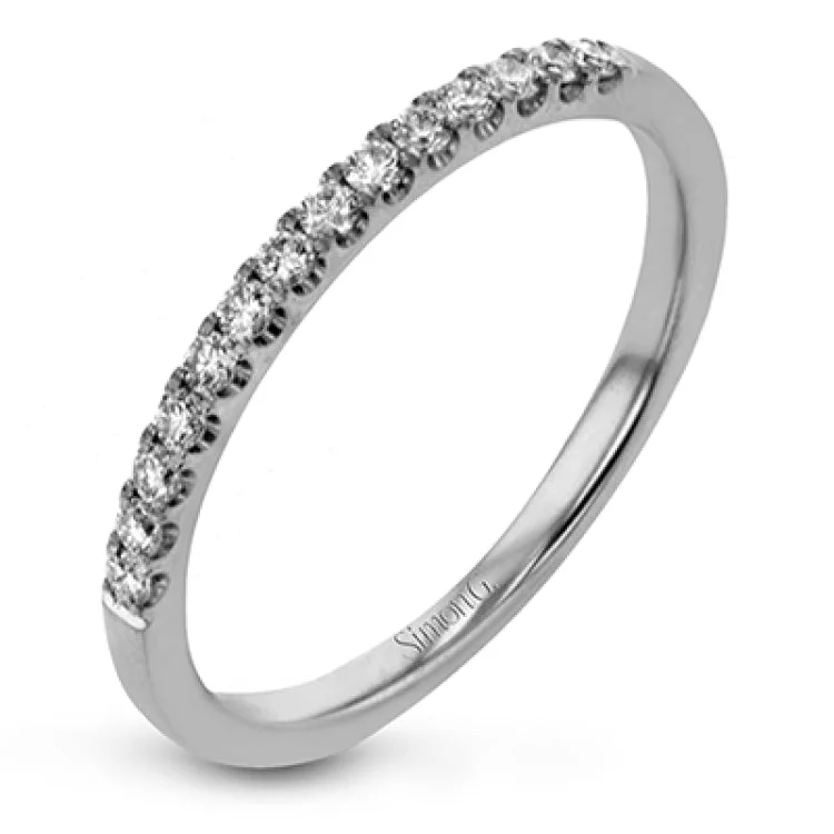 Women’s diamond-studded halo engagement ring-These darling rings are perfect for many occasions- an engagement set, a birthday or graduation present, or a ‘just because' gift to yourself.A .16 ctw round diamond sits in the middle of the set, which has .31 ctw of white side diamonds.