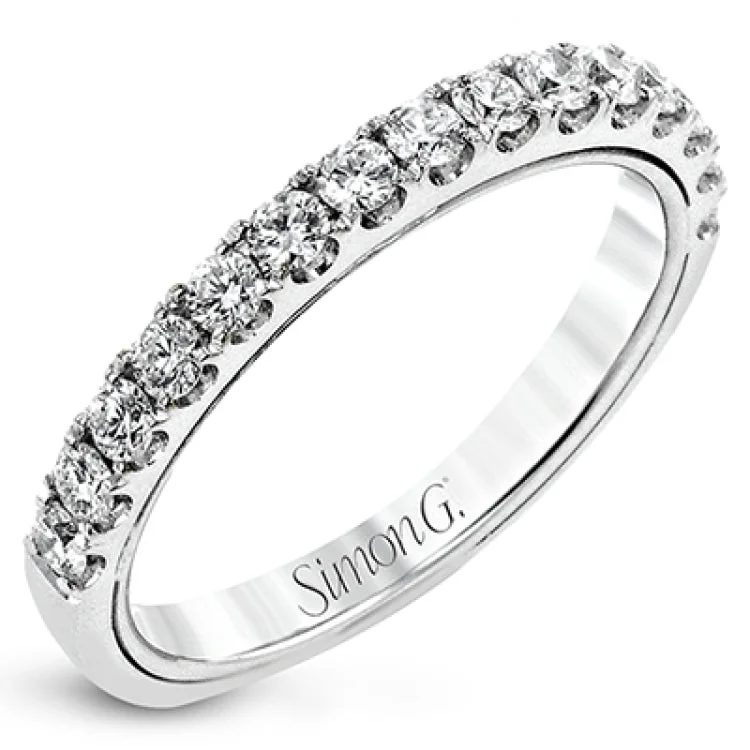 Women’s classic engagement ring-A beautiful row of .86 ctw of significant diamonds leads up to the center stone in this timeless engagement ring design.