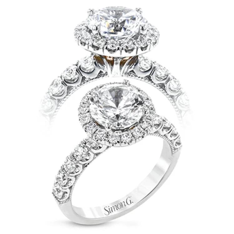 Women’s gemstone-studded engagement ring-This stunThis stunning halo engagement ring in 18K white gold takes a 2.0 ct center, and has 0.92 ctw of RD brilliant diamonds on the sides & the halo combined.