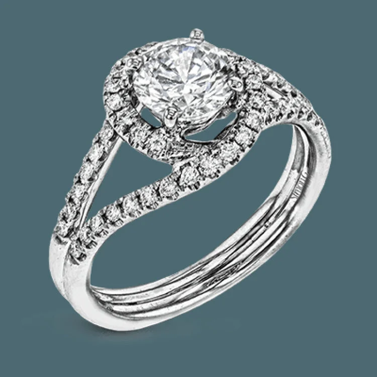 Women’s halo engagement ring with diamonds-This lovely split shank engagement setting sparkles with .35 ctw of white diamonds.